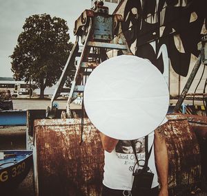 Woman standing against sky