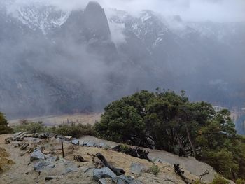 Scenic view of mountains during foggy weather