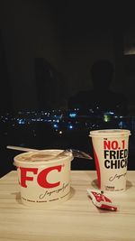 Information sign on table at night