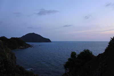 Scenic view of sea against sky at sunset