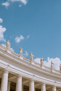 Low angle view of building against blue sky