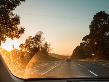 Road seen through car windshield