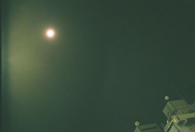 Low angle view of moon in sky