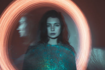 Multiple exposure of woman by firework display