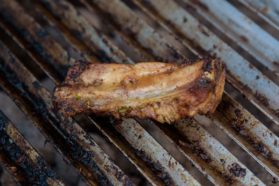 High angle view of meat on barbecue grill