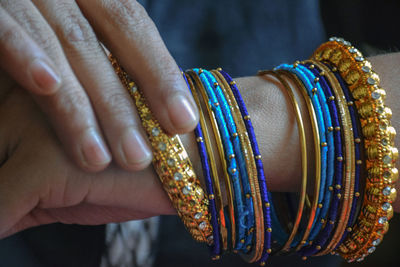 Close-up of woman wearing bangles