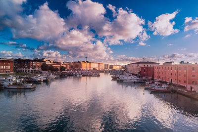 Panoramic view of river and buildings against sky