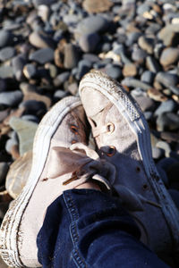 Low section of man wearing shoes outdoors