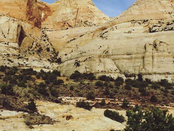 Scenic view of rocky mountains against sky