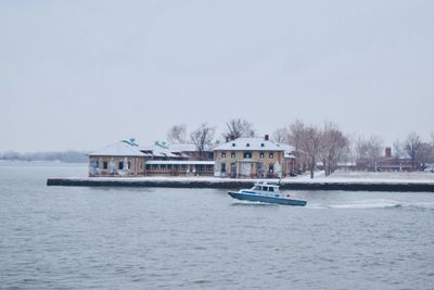 Ship in sea against clear sky