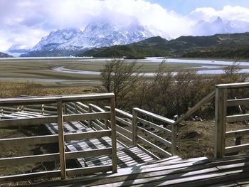 Scenic view of mountains against cloudy sky