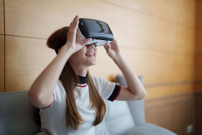 Young woman virtual reality headset