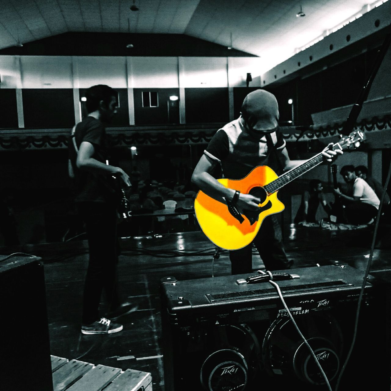 MEN ON GUITAR IN SHOPPING MALL