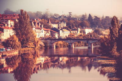 Bridge over river against sky