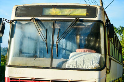 Reflection of draw on bus glass