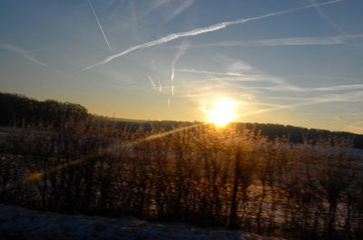 Scenic view of landscape against sky during sunset