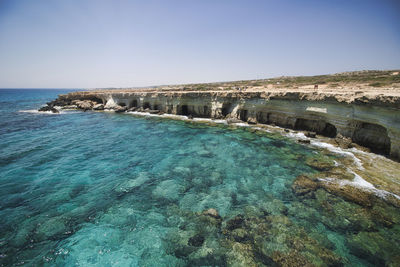 Scenic view of sea against clear sky