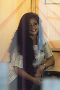 Portrait of a smiling young woman