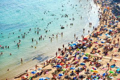 High angle view of crowd at beach in costa blanca