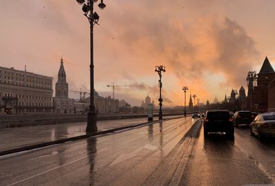 View of city street during sunset