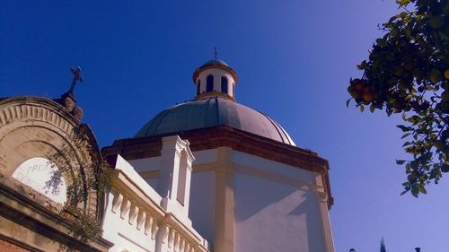 Low angle view of cathedral against clear blue sky