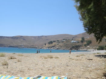 Scenic view of calm sea against clear blue sky