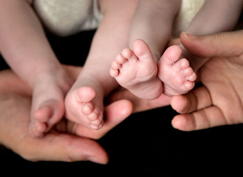 Low section of baby feet