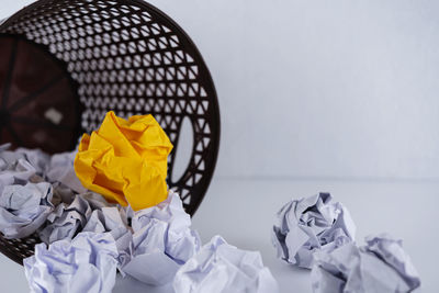 High angle view of yellow paper on table