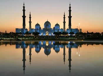 Reflection of illuminated buildings in water