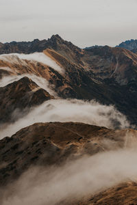 Scenic view of volcanic mountain against sky