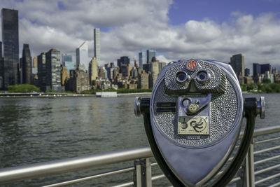 Close-up of cityscape against river