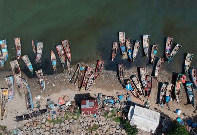 Aerial view of boats moored at beach