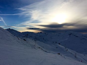 Snowcapped mountains against sky