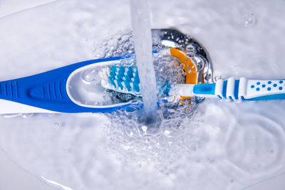 High angle view of bubbles in plastic container