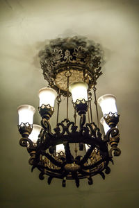 Low angle view of illuminated chandelier