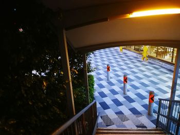 High angle view of people walking in illuminated city
