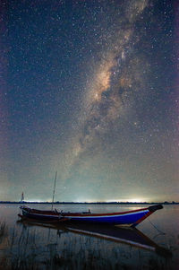 Scenic view of sea against sky at night