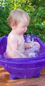 Boy playing in water