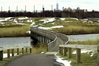 Scenic view of bridge against sky during winter