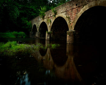 Arch bridge over water