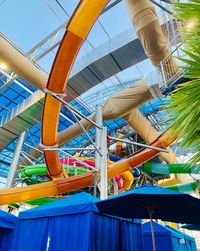 Low angle view of amusement park ride against sky