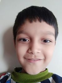 Close-up portrait of smiling boy