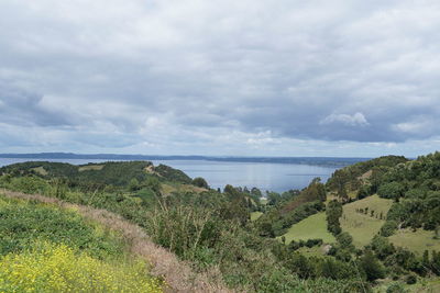 Scenic view of land against sky