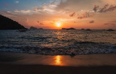 Scenic view of sea against sky during sunset