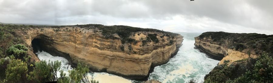 Panoramic view of rock formation against sky