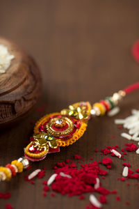 Close-up of rakhi on table