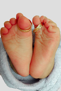 Low section of baby feet