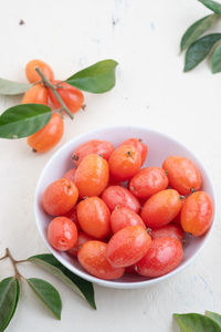 High angle view of fruits in bowl on table