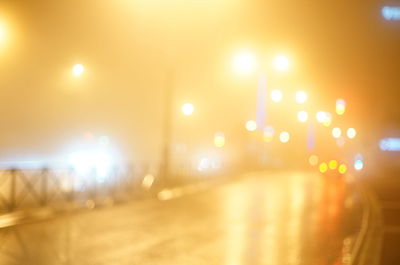 Defocused lights on road at night