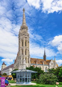 Church of the assumption of the buda castle in budapest, hungary, on a sunny summer morning